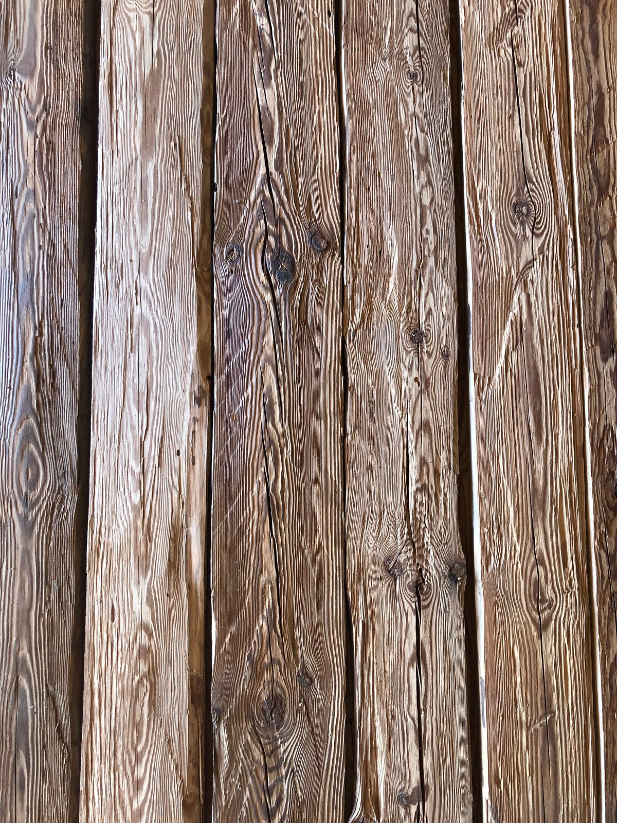 Authentic reclaimed timber boards with naturally aged wood character