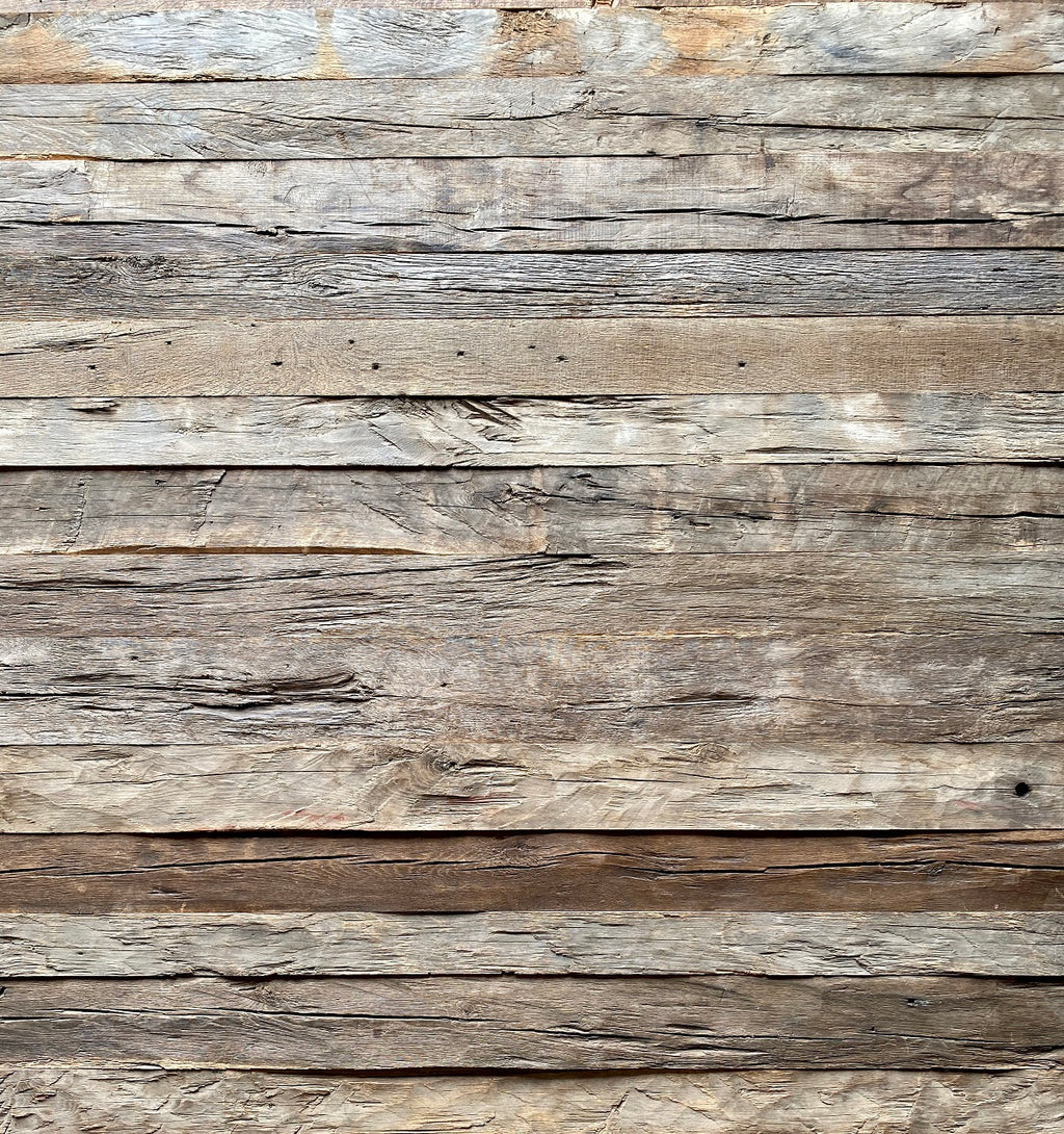 Reclaimed oak wall cladding made from hand-hewn historic boards