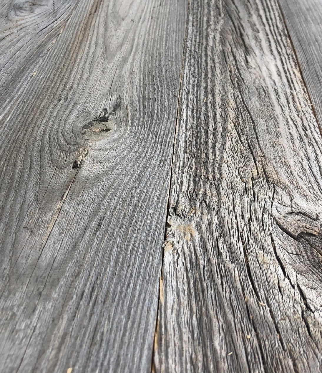 Grey reclaimed wood tongue and groove boards for wall cladding