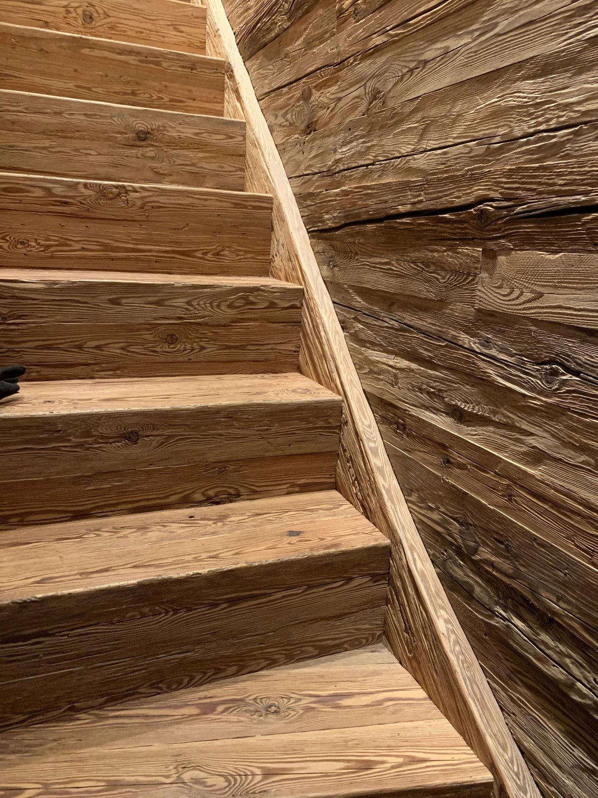 Reclaimed wood wall cladding made from hand-hewn timber boards