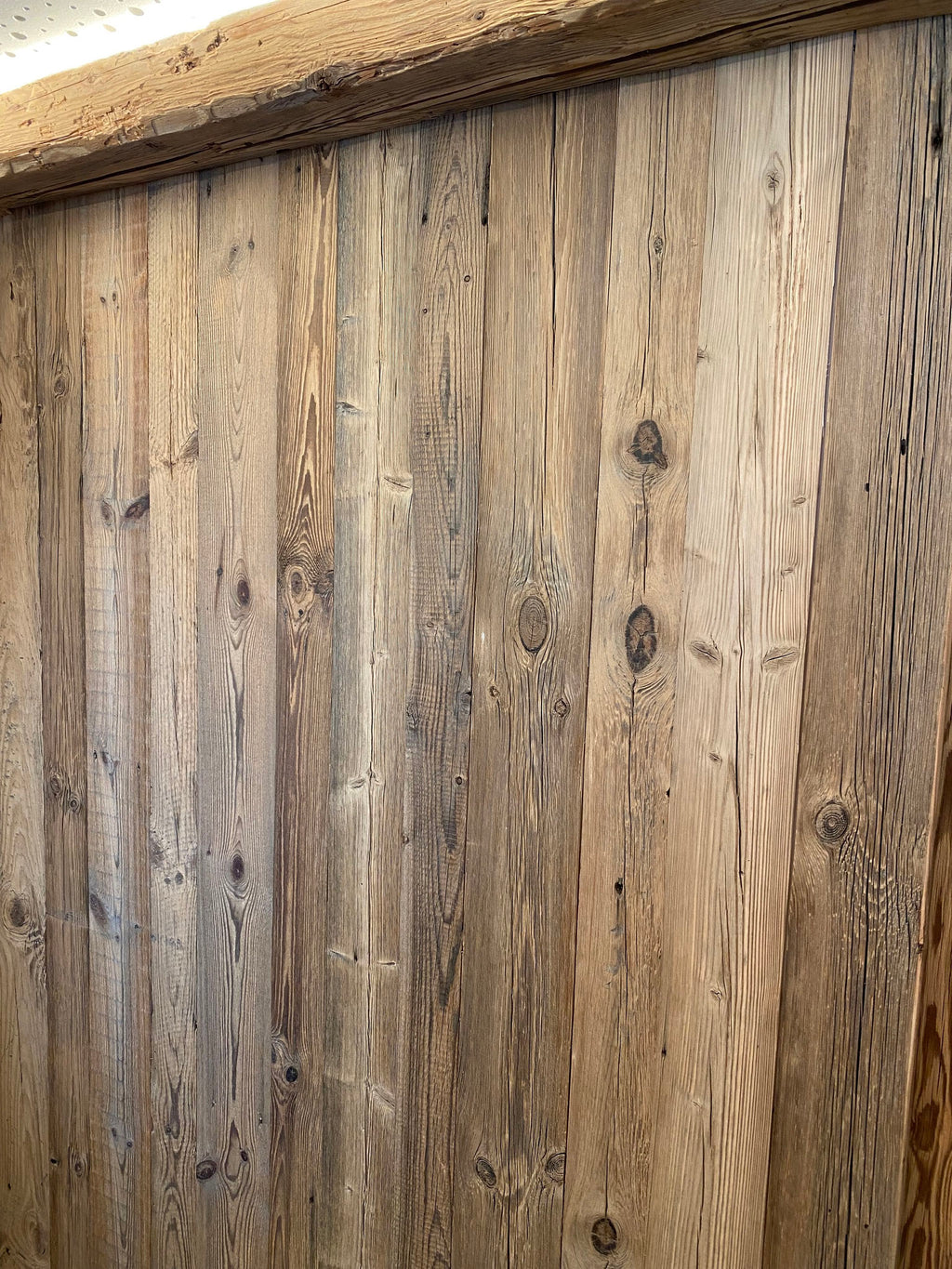 Brown reclaimed wood boards with naturally aged surface