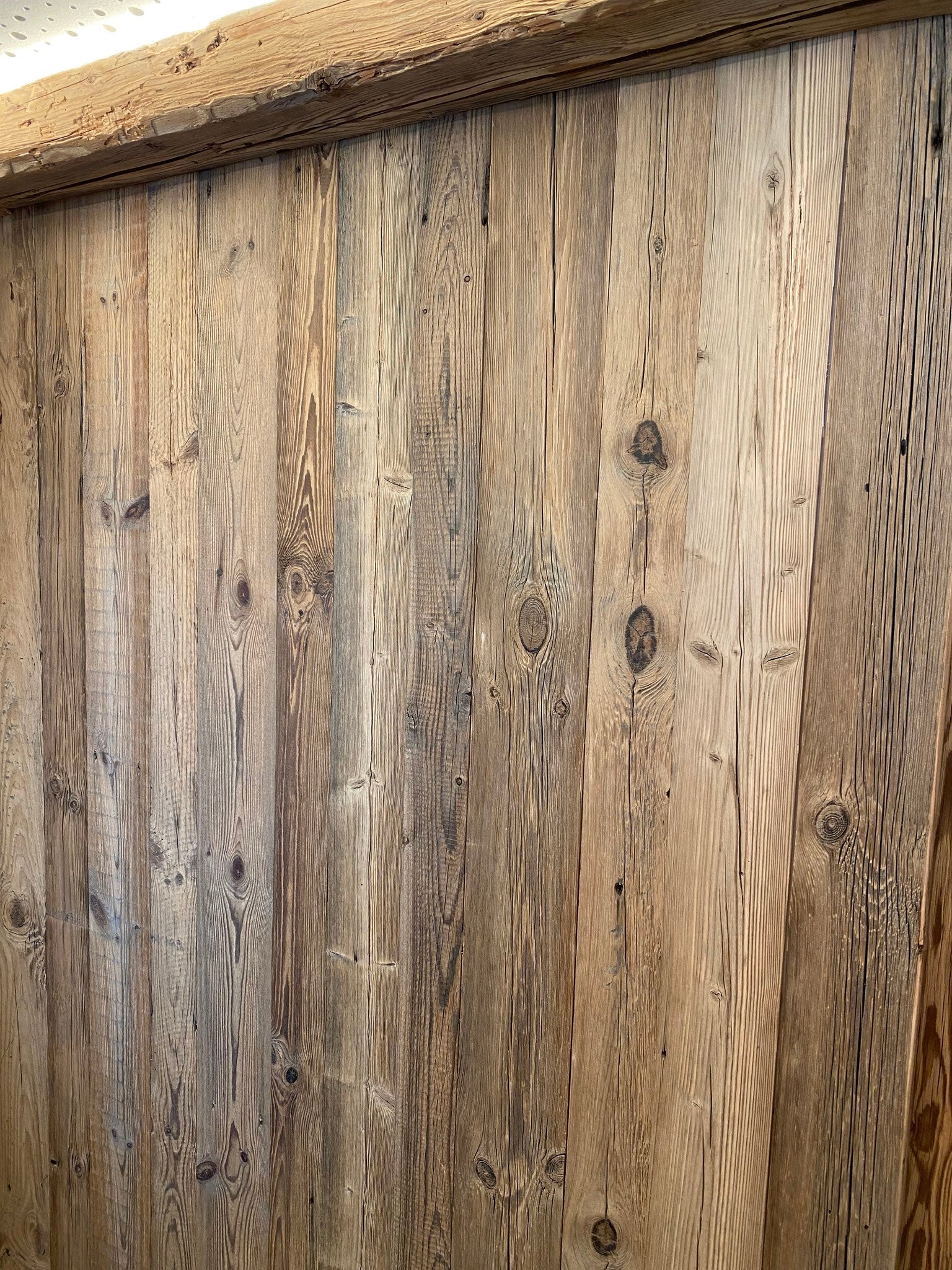 Brown reclaimed wood boards with naturally aged surface