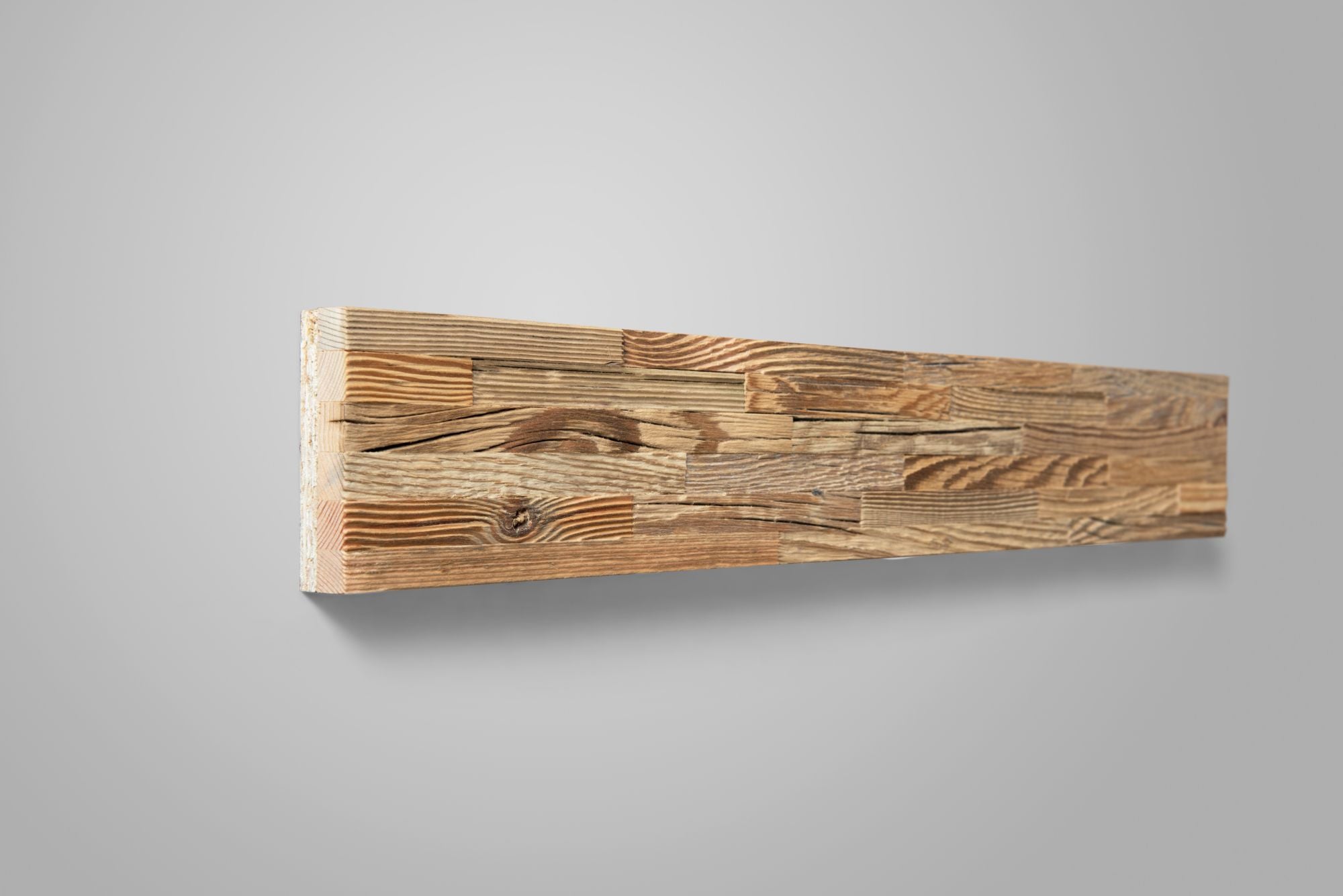 Close-up of ALM S reclaimed wood panels with varied wood textures