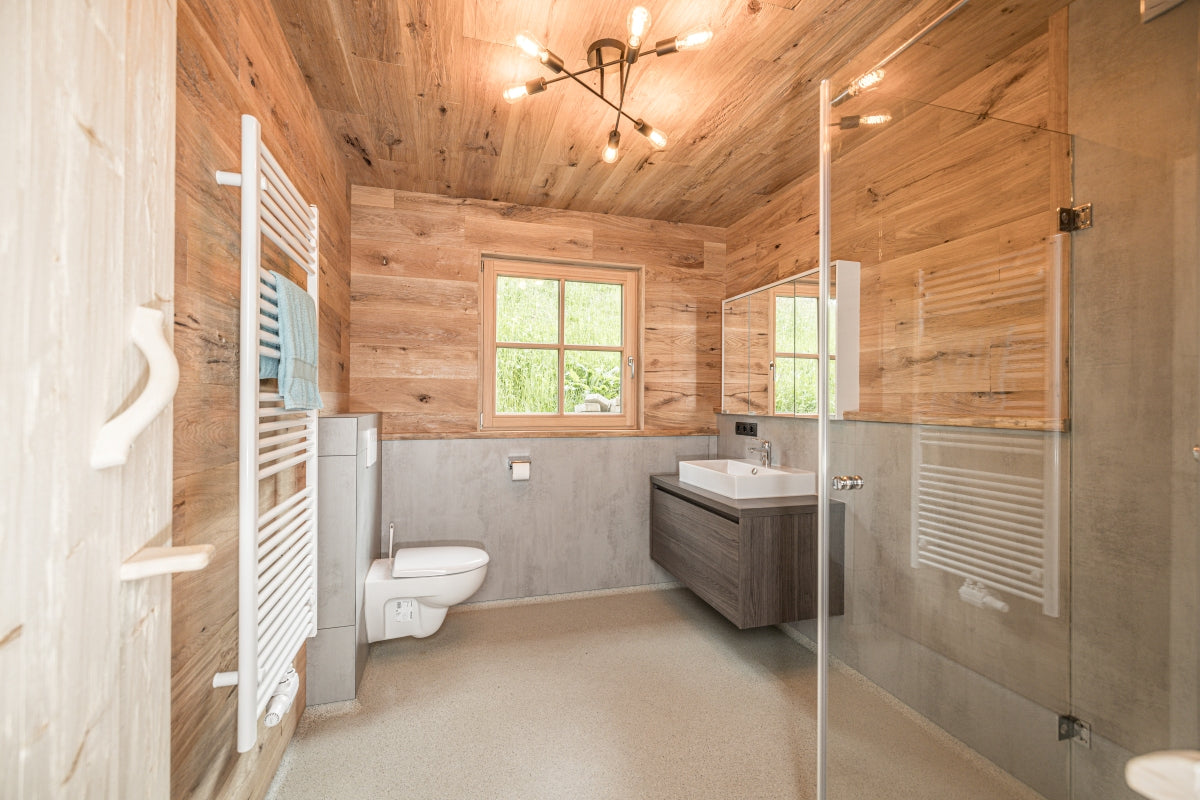 Rustic oak wall cladding with hewn and brushed finish by Vintage Holz