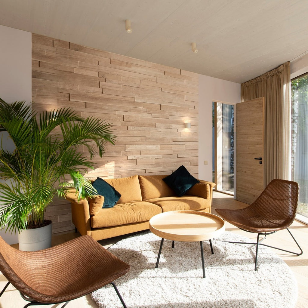 Solid oak wall cladding in a living room with warm lighting