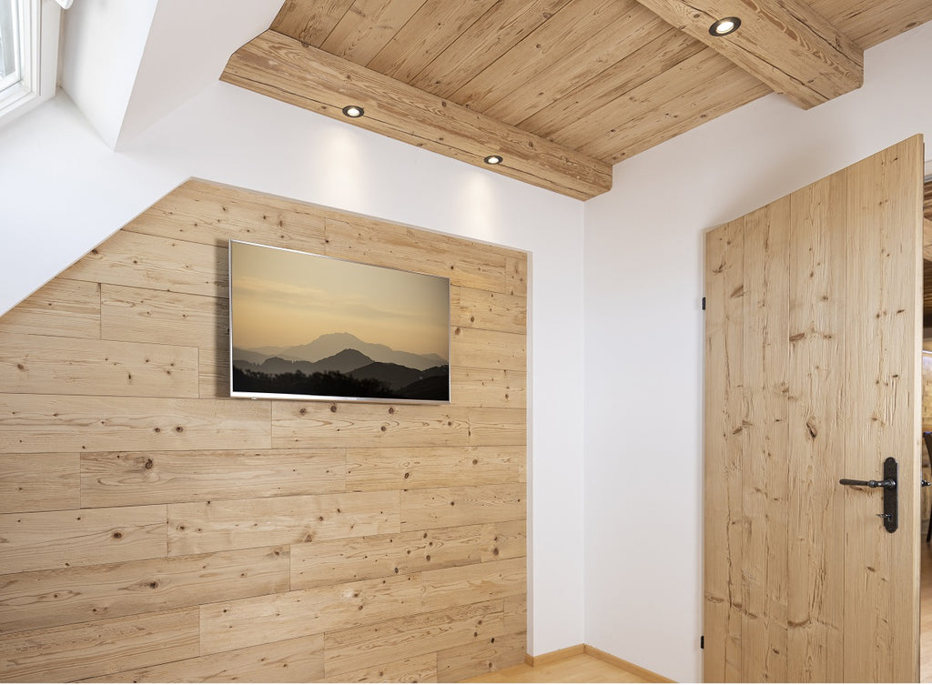 Steamed spruce wood cladding installed on an interior wall