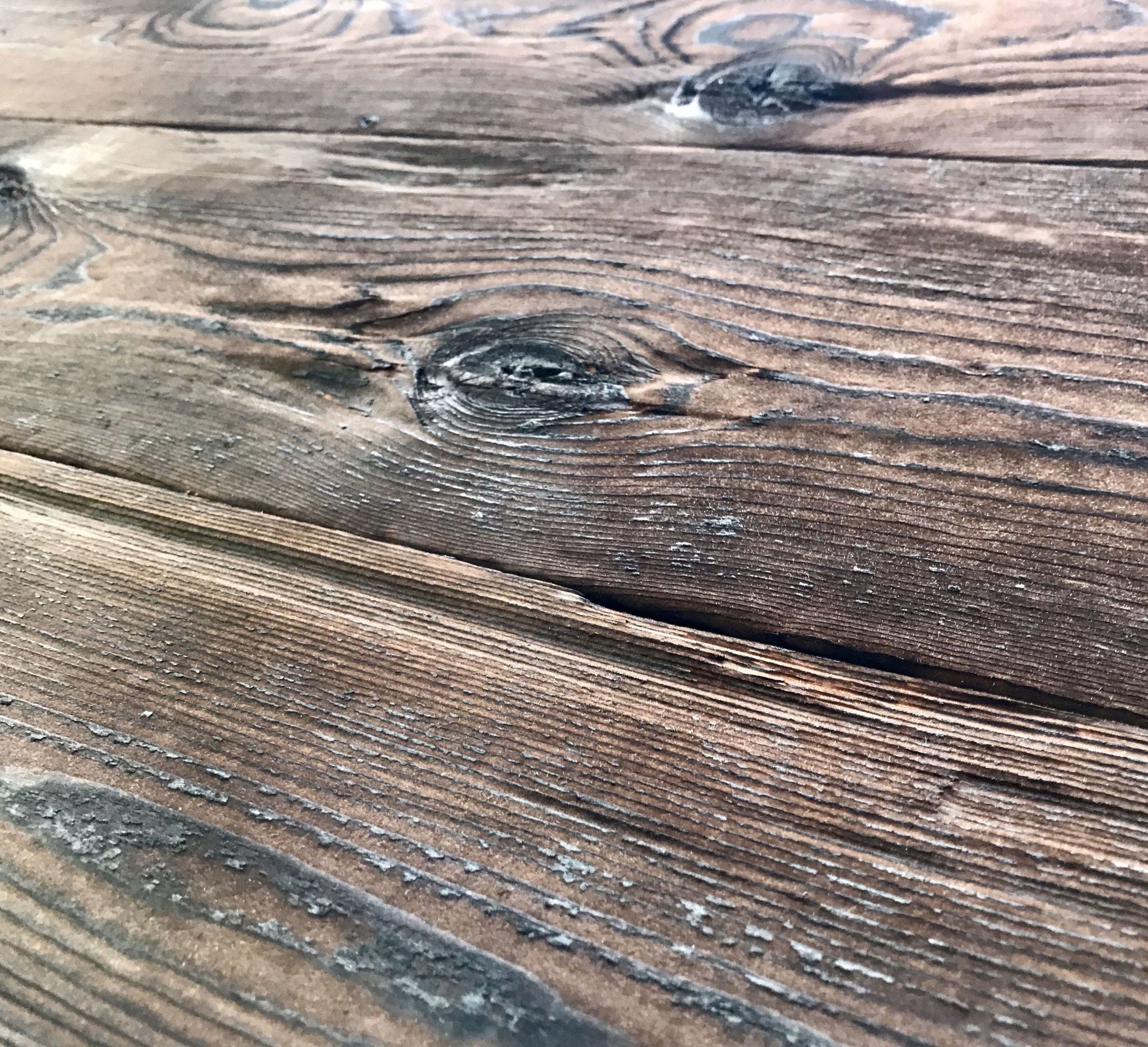 Hewn and burnt spruce wall cladding by Vintage Holz