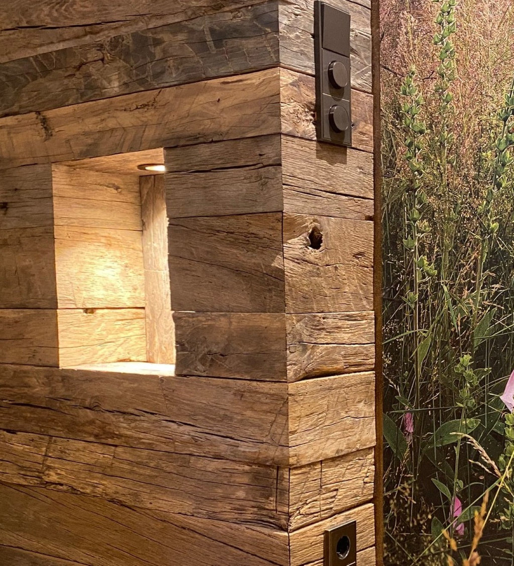 Hand-hewn reclaimed oak boards showing historic axe marks