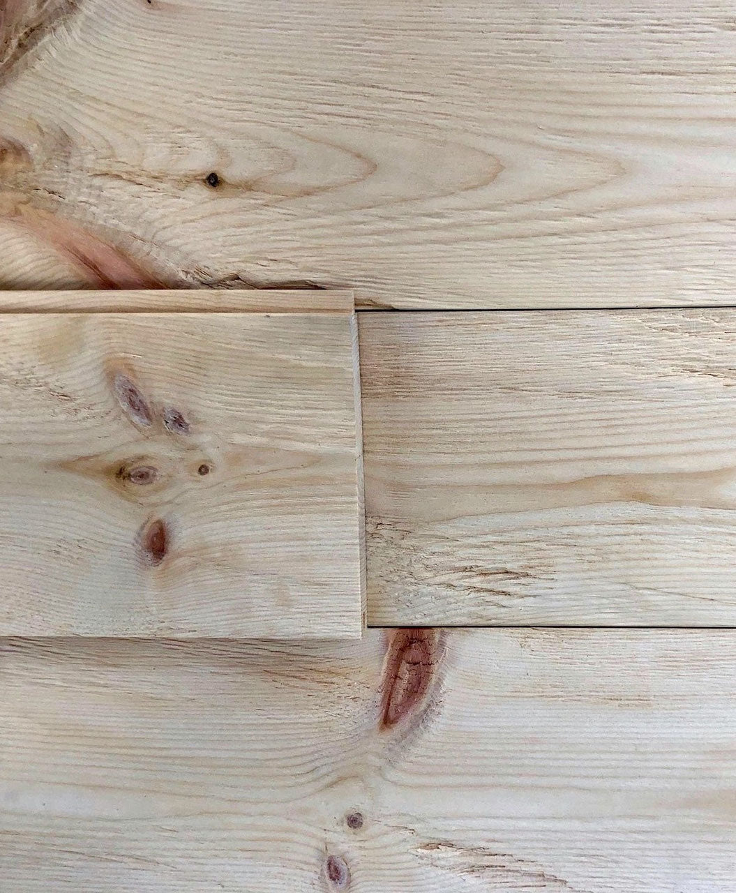 Swiss stone pine tongue and groove wall cladding with hewn and brushed surface