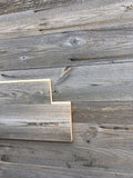 Sunburnt grey reclaimed wood tongue and groove wall cladding
