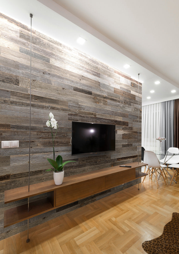 Grey reclaimed wood wall panels with natural grain and aged texture
