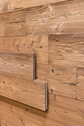 Thermo spruce tongue and groove wall cladding with hewn and brushed surface