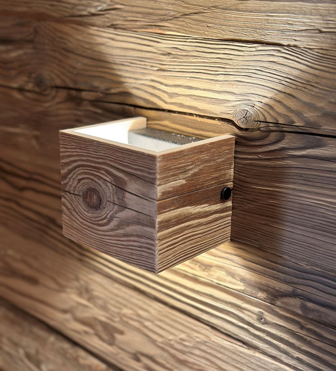 Sunburnt reclaimed wood wall light with rustic aged surface