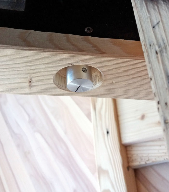 Wooden infrared lounger viewed from the side