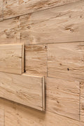 Steamed spruce tongue and groove wall cladding with hewn and brushed surface