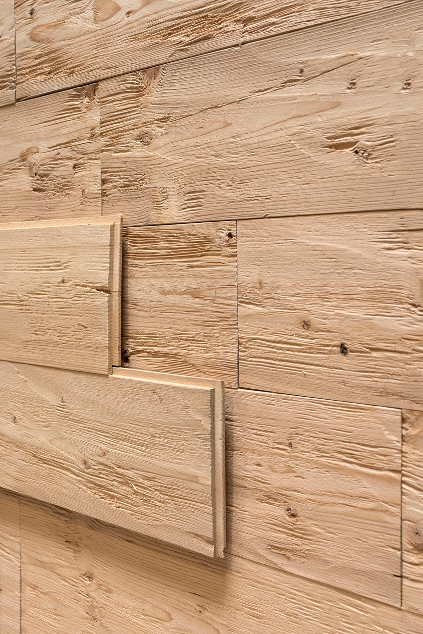 Steamed spruce tongue and groove wall cladding with hewn and brushed surface