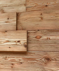 Larch tongue and groove wall cladding with hewn and brushed rustic surface