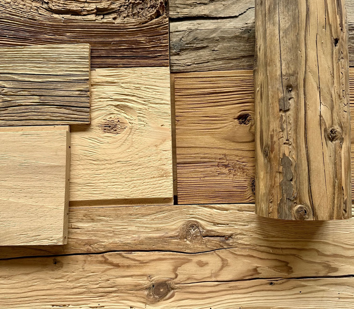 Wood wall cladding samples showing different real wood surfaces and finishes
