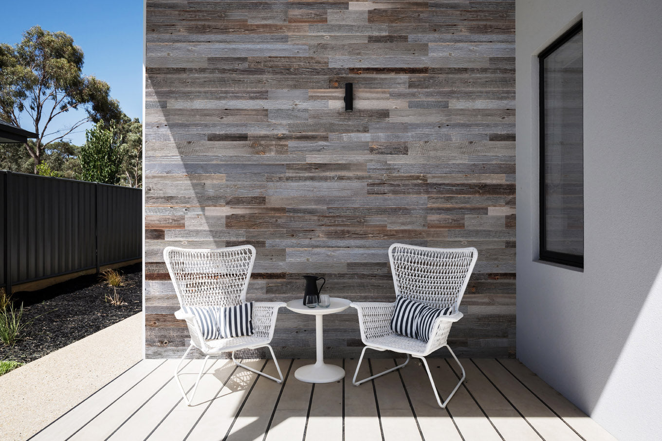 Rustic grey reclaimed wood wall cladding with authentic aged surface