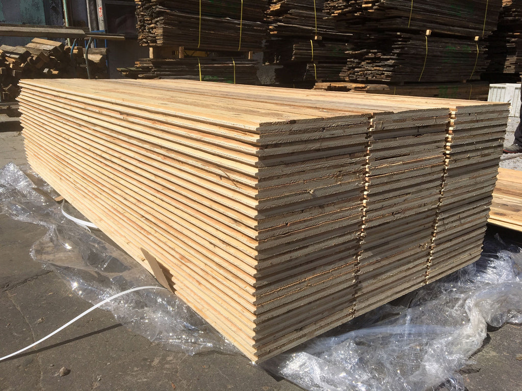 Sunburnt brown reclaimed wood three-layer tongue and groove panel for rustic wall cladding