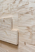 Spruce tongue and groove wall cladding with hewn and brushed rustic surface