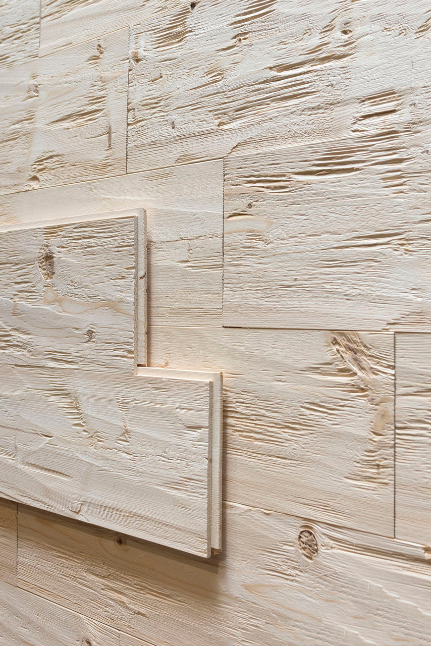 Spruce tongue and groove wall cladding with hewn and brushed rustic surface