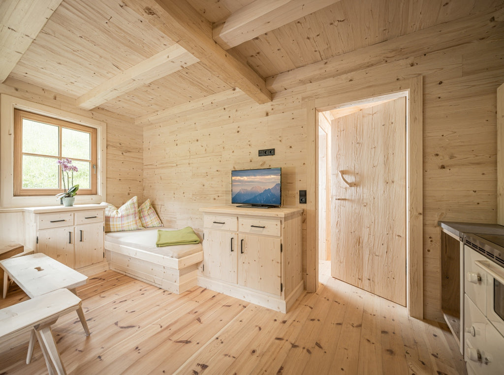 Rustic spruce tongue and groove wall cladding installed in a kitchen