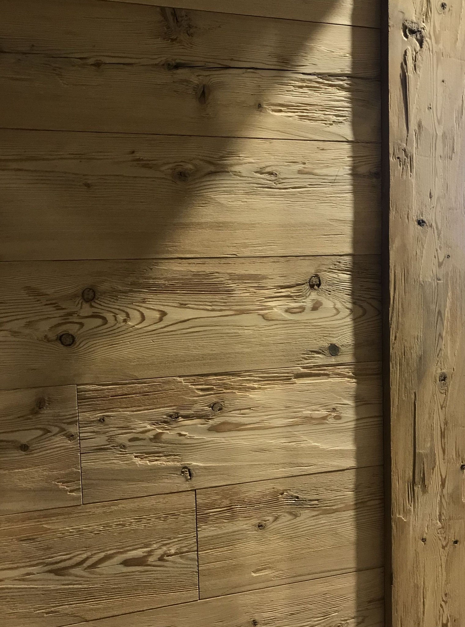 Steamed larch tongue and groove board with rustic textured surface