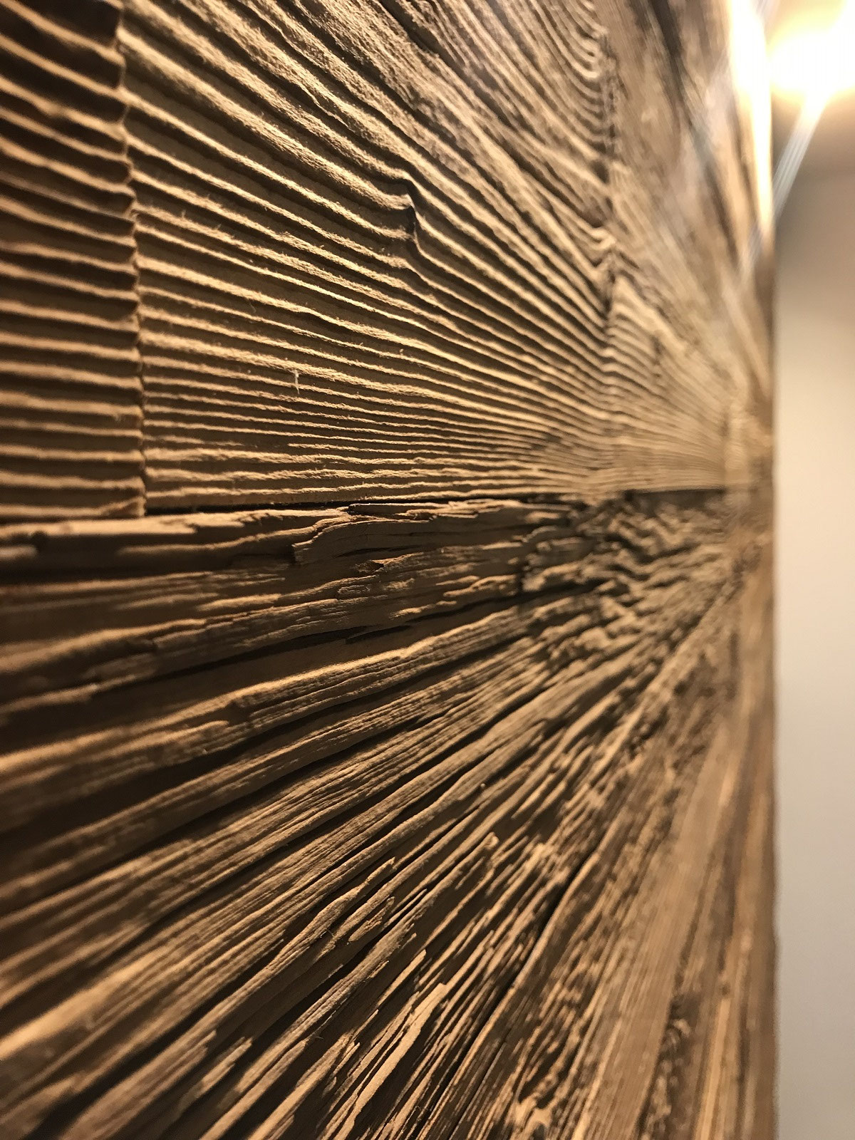 Close-up of Vario Brown reclaimed wood with natural grain and aged texture