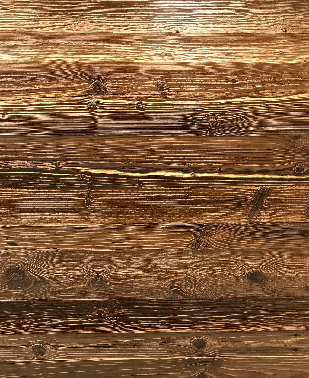 Close-up of brown reclaimed wood surface with natural colour variation