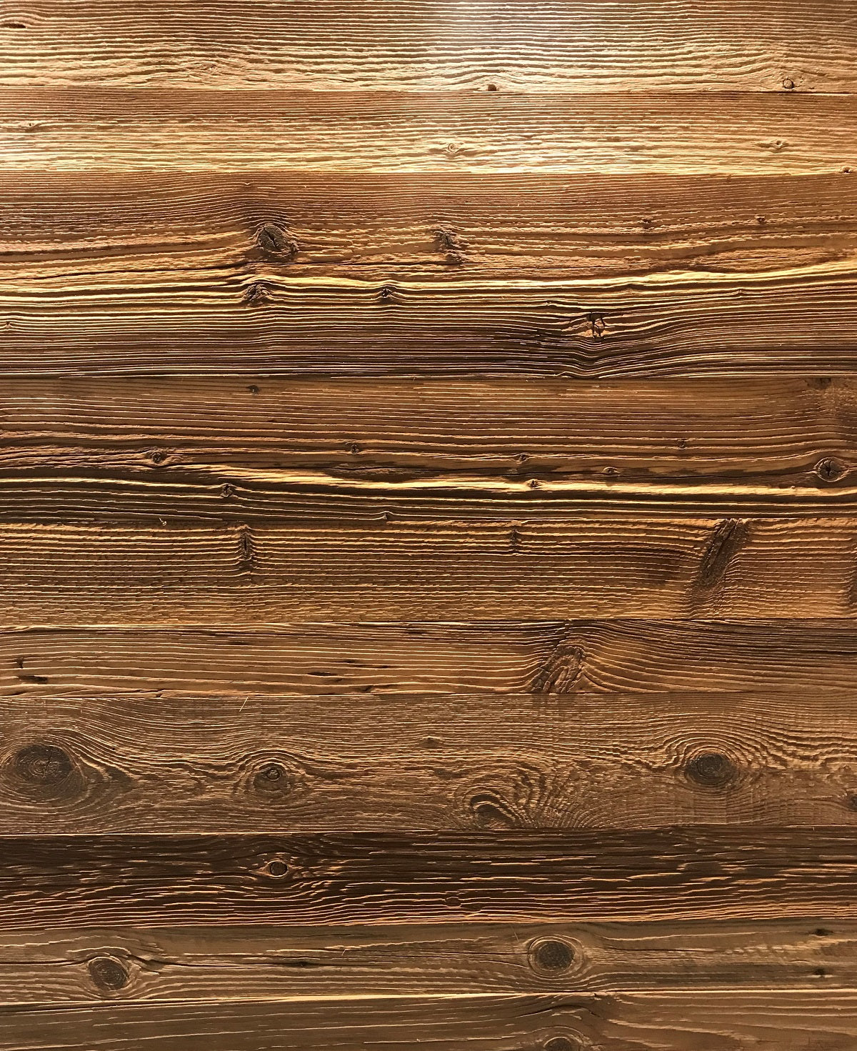 Close-up of brown reclaimed wood surface with natural colour variation
