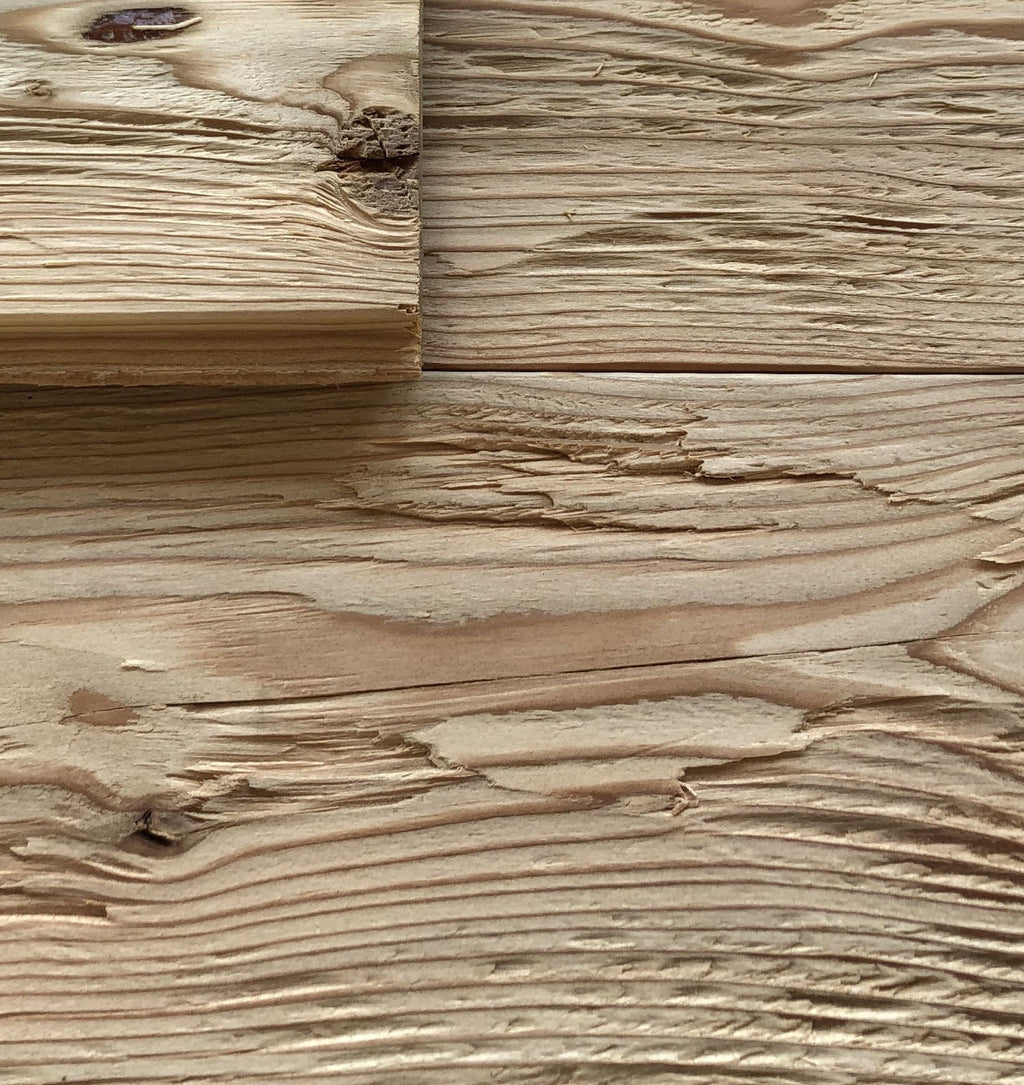 Rustic hewn larch wall cladding by Vintage Holz