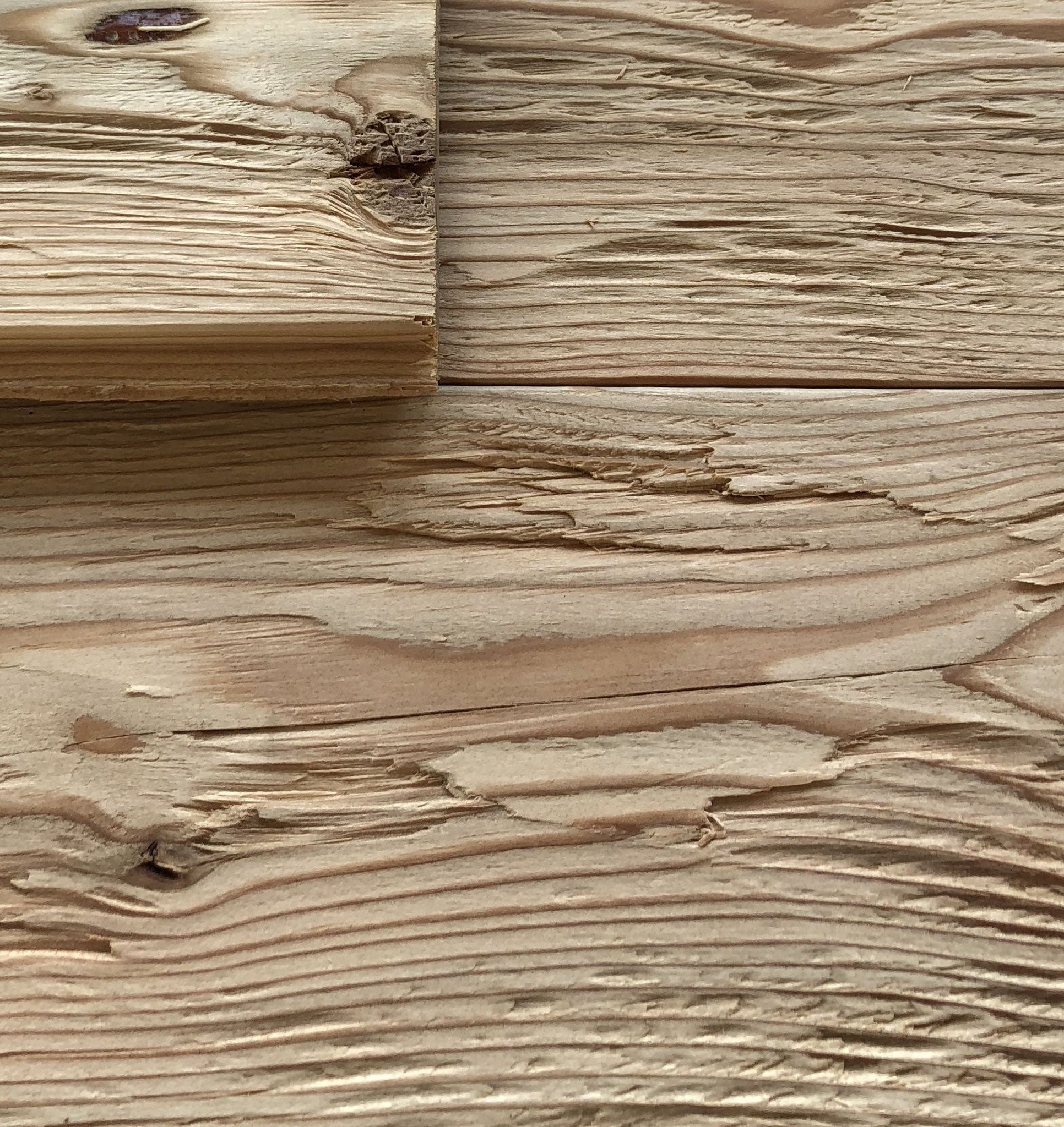 Rustic hewn larch wall cladding by Vintage Holz